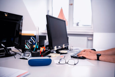 Man using laptop on table