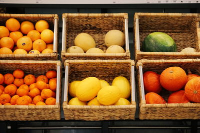 Various fruits and vegetables in basket at market stall