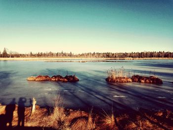 Scenic view of lake against clear sky