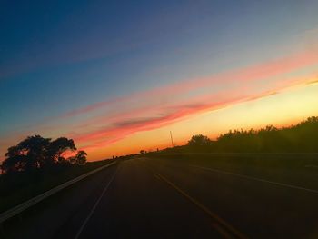 Empty road at sunset