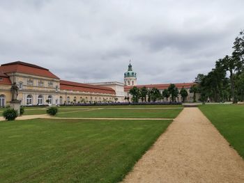 Building against cloudy sky