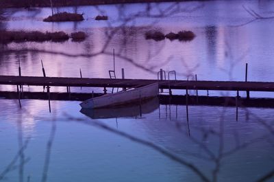 Scenic view of river against sky during winter