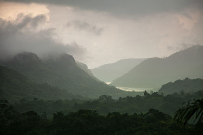 View of mountain range in foggy weather