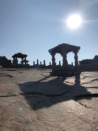 View of temple against clear sky on sunny day