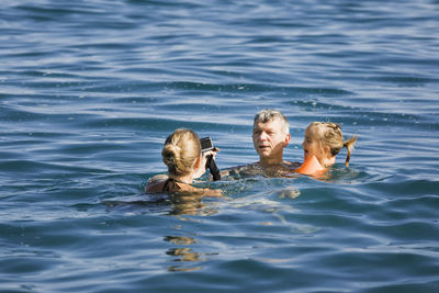 Family enjoying in sea
