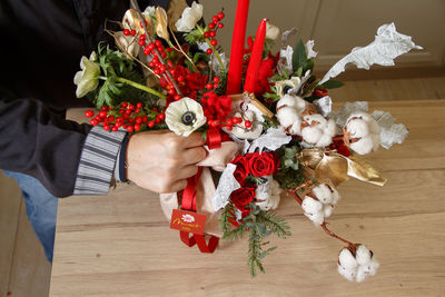 High angle view of hand holding flower bouquet