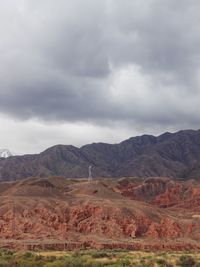 View of landscape against cloudy sky