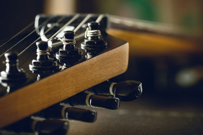 Close-up of machine part on table