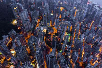 High angle view of illuminated buildings in city