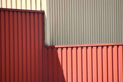 Red metal grate of building