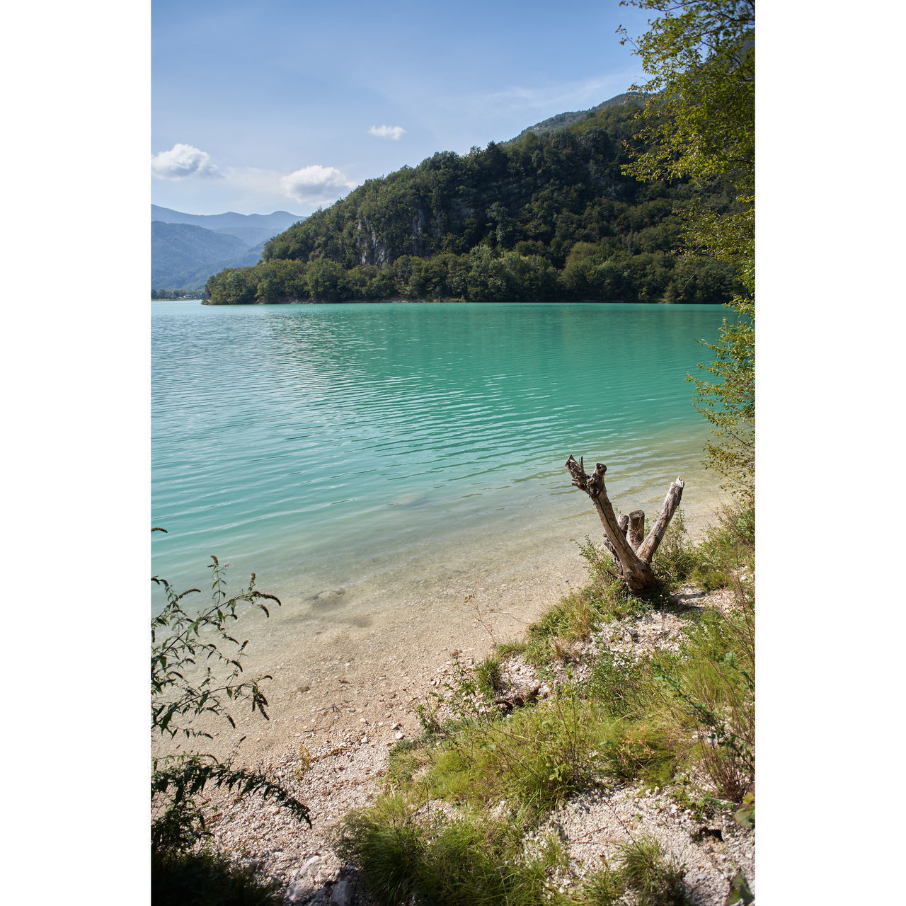 SCENIC VIEW OF LAKE AND MOUNTAINS