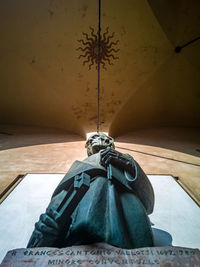 Low angle view of statue against trees