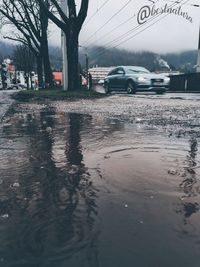 Wet street in city during rainy season