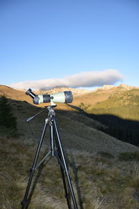 View of camera on field against sky