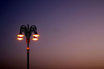 Low angle view of illuminated street light