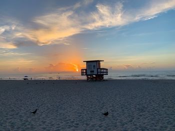 Scenic view of sea against sky during sunrise 