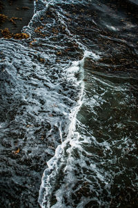 Scenic view of water flowing through rocks