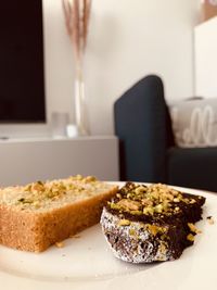 Close-up of cake served on table at home
