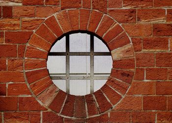 Window on brick wall of building