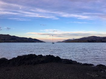 Scenic view of sea against sky during sunset