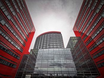 Low angle view of modern buildings against sky