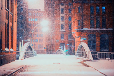 View of bridge in city during winter