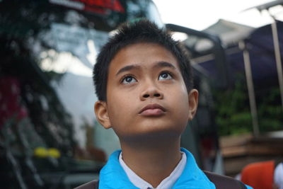 Close-up of thoughtful boy outdoors