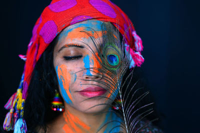 A young girl celebrating the festival of colours, holi.