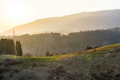 Scenic view of landscape against sky during sunset