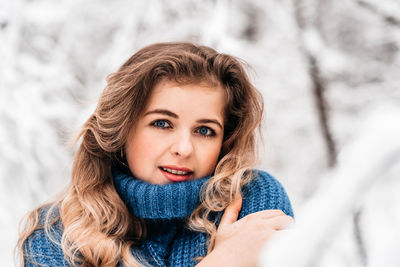 Portrait of woman in snow