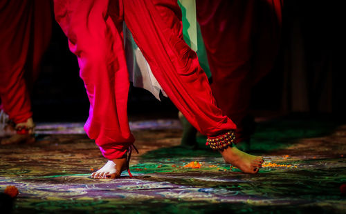 Low section of woman dancing on stage