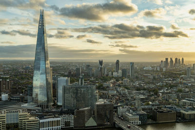 Cityscape against sky during sunset
