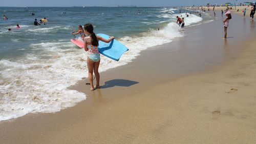 Tourists enjoying on beach