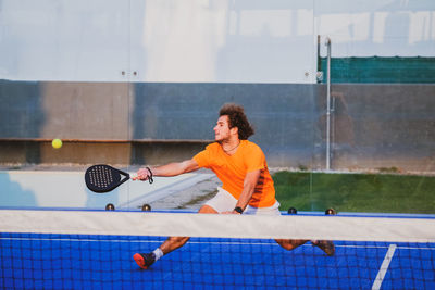 Young man playing tennis