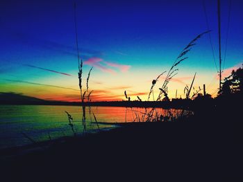 Scenic view of calm sea at sunset