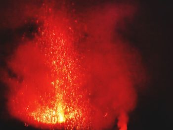 Close-up of firework display at night