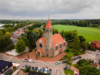 High angle view of buildings in city against sky