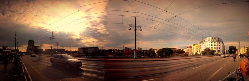 View of city street at sunset