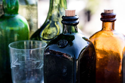 Close-up of beer glass bottles