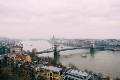 High angle view of bridge over river against cloudy sky