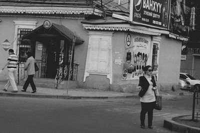 Woman standing in city