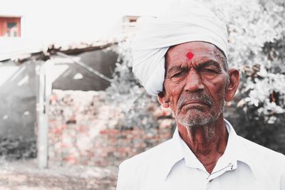 Portrait of senior man wearing turban outdoors