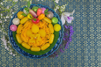 High angle view of multi colored candies on table