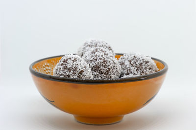Close-up of food in bowl against white background