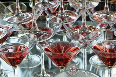 Close-up of wine glasses on table