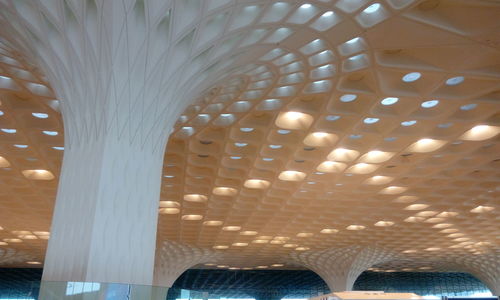 Low angle view of illuminated ceiling in building