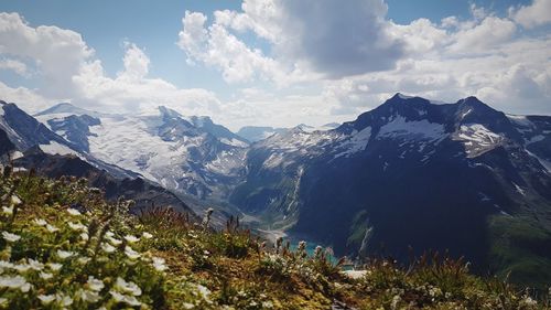 Scenic view of snowcapped mountains against sky