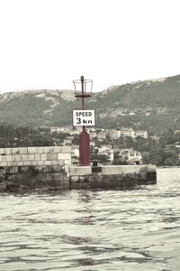 Information sign in water