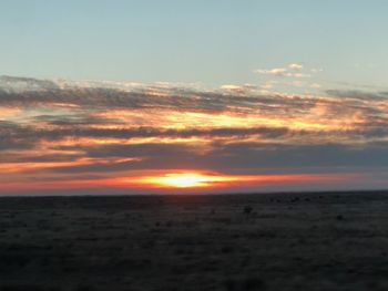 Scenic view of sunset over sea