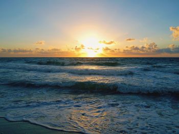 Scenic view of sea against sky during sunset